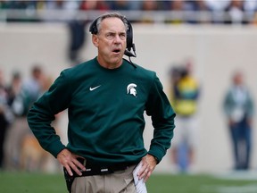 Michigan State Spartans head football coach Mark Dantonio watches the action during the first quarter of the game against the Michigan Wolverines at Spartan Stadium on October 29, 2016 in East Lansing, Michigan.