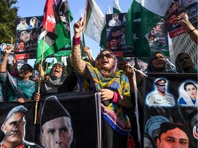 Demonstrators shout slogans during a protest against India in Karachi on Aug. 22, 2019, as they condemn India's decision to strip the disputed Kashmir region of its special autonomy and impose a lockdown two weeks ago.