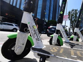 E-scooters are pictured along a Los Angeles street on August 22, 2019.