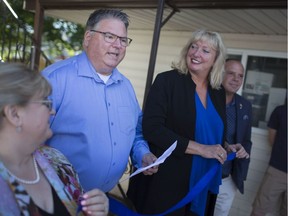 Conservative candidate for Windsor-Tecumseh, Leo Demarce, pictured with his wife, Karen, left, and Sarnia-Lampton MP Marilyn Gladu, speaks at the opening of his campaign office in Tecumseh, Friday, August 23, 2019.