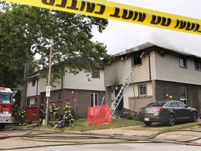 Windsor firefighters at the scene of a house fire on Copperfield Place in the Little River Acres area of the city's east end on Aug. 11, 2019.
