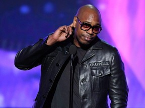 Comedian Dave Chappelle speaks onstage during the 60th Annual Grammy Awards at Madison Square Garden in New York City on Jan. 28, 2018.
