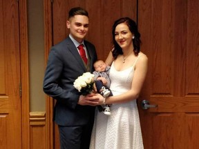 Dominick Lintl (left) of Windsor with his wife Jacqui Daviau-Thompson and their infant son Oliver.
