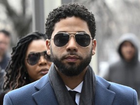 In this March 14, 2019 file photo, Empire actor Jussie Smollett arrives at the Leighton Criminal Court Building for his hearing in Chicago.