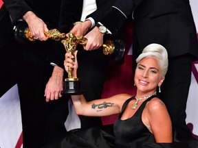 Best Original Song winners for "Shallow" from "A Star is Born" Lady Gaga, Mark Ronson, Anthony Rossomando and Andrew Wyatt poses in the press room with the Oscar during the 91st Annual Academy Awards at the Dolby Theater in Hollywood, California on February 24, 2019. FREDERIC J. BROWN/AFP/Getty Images