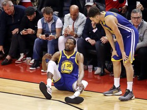 Kevin Durant of the Golden State Warriors reacts against the Toronto Raptors in the first half during Game 5 of the 2019 NBA Finals at Scotiabank Arena on June 10, 2019 in Toronto. (Claus Andersen/Getty Images)