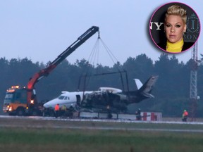 Emergency services are seen next to a Cessna 560XL that caught fire upon landing at Aarhus Airport in Tirstrup in the early hours of Aug. 6, 2019. The manager and other staff of Pink (inset), who had given a concert in Oslo the night before were among the 10 passengers and crew who all escaped without injuries.