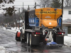 Too much salt? A snow plow removes melting snow and applies salt on Lens Avenue in Windsor on Jan. 23, 2019.