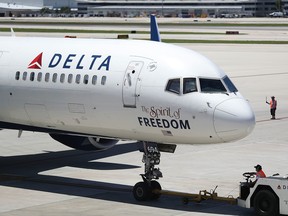 A Delta airlines plane is seen on the tarmac of the Fort Lauderdale-Hollywood International Airport on July 14, 2016 in Fort Lauderdale, Florida.