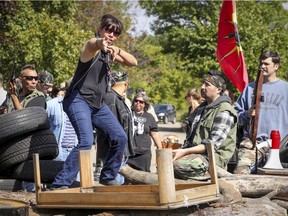 Writer-director Tracey Deer stands on the barricade as she gives directions to actors during rehearsal of a scene from Beans, her story of a Mohawk girl's experience growing up in Kahnawake during the 1990 Oka Crisis.