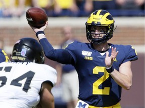 Shea Patterson of the Michigan Wolverines passes the ball against the Army Black Knights during the first half at Michigan Stadium on September 7, 2019 in Ann Arbor, Michigan.