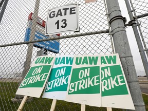 United Auto Workers (UAW) strike signs are shown at a gate at the General Motors Flint Assembly Plant after the UAW declared a national strike against GM at midnight on September 16, 2019 in Flint, Michigan. Nearly 50,000 members of the United Auto Workers went on strike after their contract expired and the two parties could not come to an agreement.