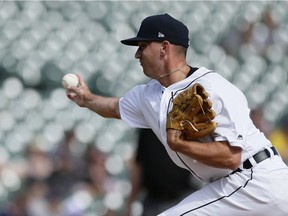 John Schreiber of the Detroit Tigers pitches against the Chicago White Sox during the sixth inning at Comerica Park on September 22, 2019 in Detroit, Michigan. The Tigers defeated the White Sox 6-3.