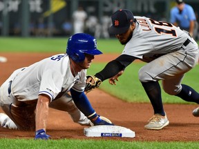 Brett Phillips of the Kansas City Royals slides into third for a steal past third baseman Dawel Lugo of the Detroit Tigers in the sixth inning at Kauffman Stadium on September 04, 2019 in Kansas City, Missouri.