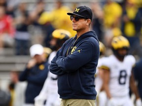 Head coach Jim Harbaugh of the Michigan Wolverines watches action prior to a game against the Wisconsin Badgers at Camp Randall Stadium on September 21, 2019 in Madison, Wisconsin.