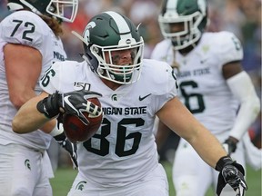 Drew Beesley of the Michigan State Spartans celebrates an interception against the Northwestern Wildcats at Ryan Field on September 21, 2019 in Evanston, Illinois. Michigan State defeated Northwestern 31-10.