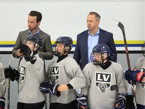 Lasalle Vipers coaches Nathan Savage, left, and head coach and general manager John Nelson look on during an exhibition game.