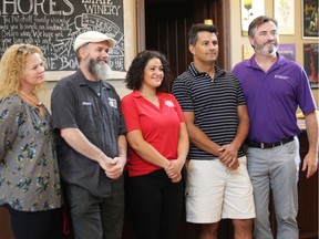 From left, Vicki Hedge, resource development coordinator for Big Brothers Big Sisters of Windsor Essex, Michael Beaudoin of Chapter Two Brewing Company, Kate Dipierdomenico of Walkerville Brewery, Stephen Mitchell of Sprucewood Shores Estate Winery, and Kieran McKenzie, director of development and donor relations for Big Brothers Big Sisters.  The group on Thursday, September 12, 2019 announced the addition of a Beverage Battle to the annual Battle of the Hors D'Oeuvres.