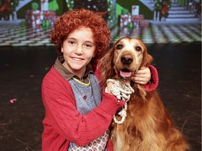 Peyton Del Papa, 10, with dog Sandy in Cardinal Music Productions presentation of Annie at The Green Room Theatre located E.J. Lajeunesse High School Wednesday.