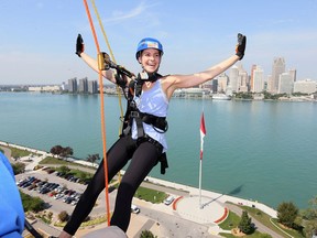 Samantha Courtis descends from the 15th floor of the CIBC building in downtown Windsor during Make A Wish Foundation's Rope for Hope event on Friday, Sept. 20, 2019. About 25 people rappelled down 15 storeys to raise money for the charity, which helps terminally ill children realize their dreams. Event organizers raised $60,000 to support local wish-granting efforts.