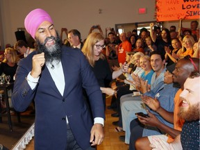 NDP leader Jagmeet Singh arrives to thunderous applause for a town hall meeting attended by hundreds at Windsor's Fogolar Furlan Club on Sept. 20, 2019.