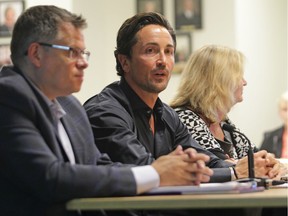 Peter Valente (centre), president of Beachside Development Ltd., presents to Lakeshore town councillors Tuesday, September 24, 2019, about his plans for a massive housing development in the municipality.