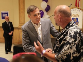 People's Party of Canada leader Maxime Bernier greets supporters after speaking to a room of about 150 party members at the Ciociaro Club in Oldcastle, Ontario on Monday, September 30, 2019.