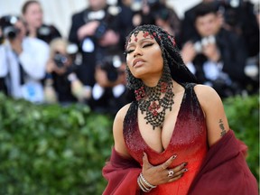 In this file photo taken on May 07, 2018, rapper Nicki Minaj arrives for the 2018 Met Gala at the Metropolitan Museum of Art in New York. Minaj on Sept. 5, 2019, surprised fans by announcing her retirement from rap, saying she was going to focus on family.