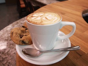 A cappuccino and a truffle cookie, served up at Anchor Coffee House in 2014.