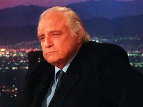 Actor Marlon Brando sits during a break 05 April during the CNN television show Larry King Live in Hollywood, California.