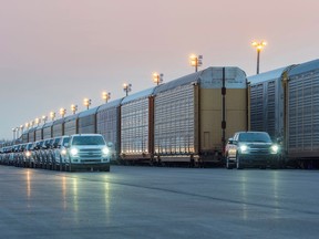 An all-electric Ford F-150 prototype tows more than 1.25 million pounds of rail cars and trucks during a test in Dearborn, Michigan, U.S., July 10, 2019. Picture taken July 10, 2019.