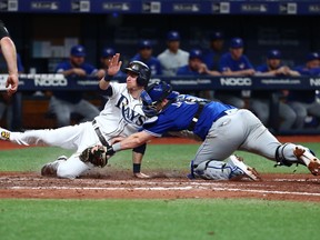 Toronto Blue Jays catcher Danny Jansen (9) tags out Tampa Bay Rays third baseman Matt Duffy (5) during the eighth inning at Tropicana Field in St. Petersburg, Fla., Sept. 6, 2019.