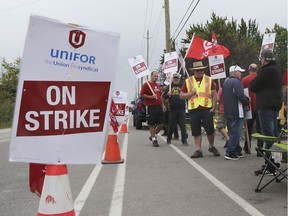 Employees of Canadian Engineering & Tool Co. on South Cameron Boulevard in Windsor walk the picket line on Monday, September 9, 2019.