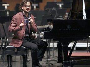 Daniel Wnukowski, raised in Windsor and now a pianist with an international reputation, is shown performing for local school students on Feb. 15, 2019, at the Capitol Theatre.