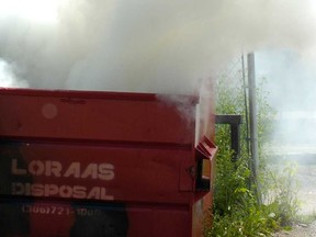 A literal dumpster fire in Regina, Saskatoon, is shown in this 2011 file photo.