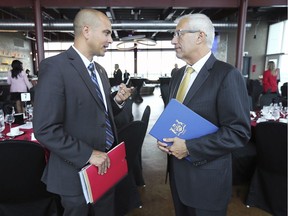 Jonathon Azzopardi, left, President of Laval International in Tecumseh chats with Victor Fedeli, Ontario Minister of Economic Development, Job Creation and Trade on Monday, September 9, 2019, at the Emerging Technologies in Automation conference and trade show at Caesars Windsor.