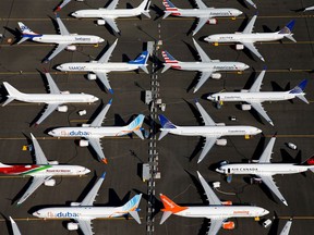 FILE PHOTO: Grounded Boeing 737 MAX aircraft are seen parked in an aerial photo at Boeing Field in Seattle, Washington, U.S. July 1, 2019. Picture taken July 1, 2019.