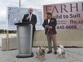 Windsor Mayor Drew Dilkens, left, and Shmuel Farhi, president of Farhi Holdings Corporation are shown during a press conference on Wednesday, September 25, 2019, where they announced a major residential housing development near the WFCU Centre.