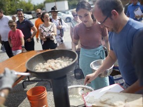 Teams compete making halusky, a traditional Slovakian small dumpling, at the Halusky Festival Windsor at St. Cyril's Slovak Centre on Sept. 21, 2019.