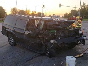 The wreckage of a black SUV involved in a collision at Highway 3 and Walker Road just outside of Windsor during the evening of Sept. 25, 2019.