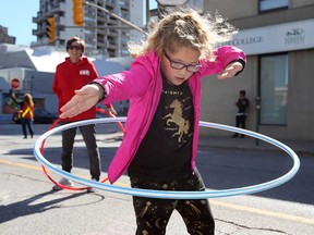 Ava Wilson, 8, shows off her hula hoop skills in the September 2018 edition of Open Streets Windsor.