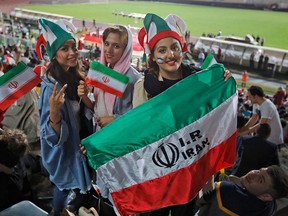 In this file photo taken on June 25, 2018 Iranian women watch the World Cup Group B soccer match between Portugal and Iran at Azadi stadium in Tehran. (ATTA KENARE/AFP/Getty Images)