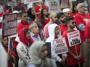 Local Pakistanis hold a rally at Charles Clark Square to raise awareness about the ongoing Kashmir crisis, Sunday, Sept. 8, 2019.