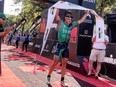 Windsor professional triathlete Lionel Sanders celebrates his victory at Ironman 70.3 in Augusta, Georgia, on Sept. 29, 2019.
