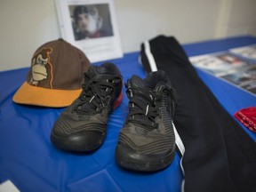 David MacLellan's clothes, including his shoes, hat, and bandanna, are on display at a Moose Lodge where a celebration of his life was being held, Sunday, September 22, 2019. MacLellan died tragically while living on the streets in March.