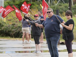 Unifor supporters are shown in front of the Nemak plant in west Windsor on Wednesday, September 11, 2019.