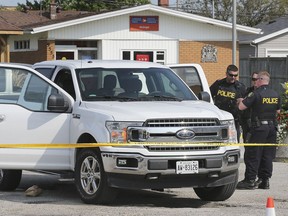 OPP officers are shown near a truck that was the subject of an investigation into an injured man on Tuesday, Sept. 10, 2019, in McGregor.