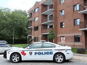 A Windsor police cruiser waits at Parkwood Manor on Sept. 23, 2019, the day after a fire in a unit on the second floor.