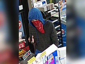 A security camera image of the masked robber of a Mac's Convenience Store at 1093 Lauzon Rd. on Sept. 23, 2019.