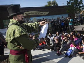 Hunter Kersey, the Town Crier, takes part in the unveiling of Port Windsor's Outdoor Marine Museum, called Prosperty Place, Thursday, September 26, 2019.